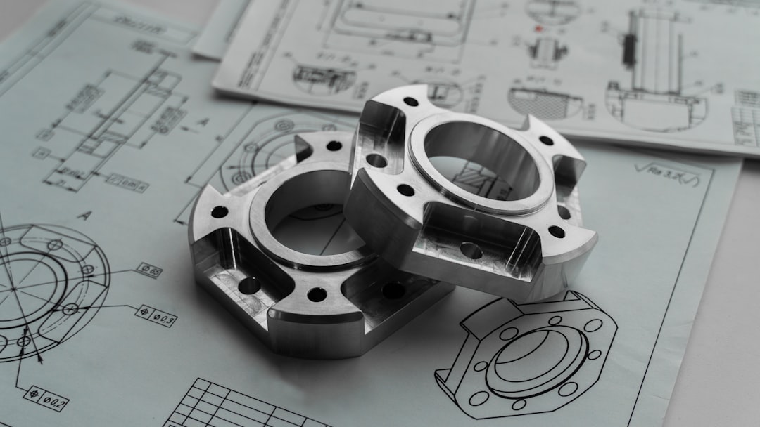 FreeCAD vs AutoCAD comparison hero — engineering blueprint